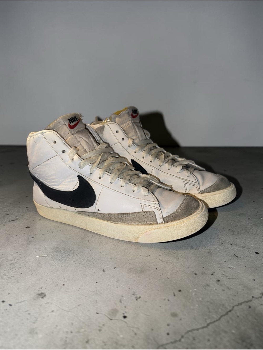Nike High-Top Sneakers in White and Black with Suede Accents